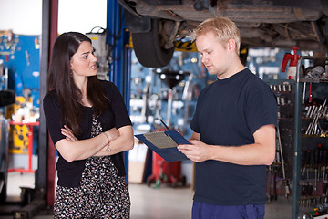 Image showing Angry Customer with Mechanic