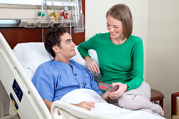 Image showing Wife giving present to husband