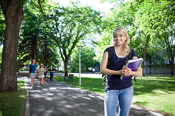 Image showing Portrait of smiling college girl