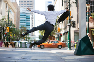 Image showing Business Man Jumping in Air