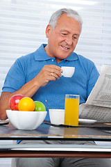 Image showing Senior Man Reading Newspaper