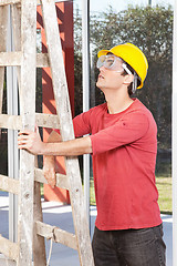 Image showing Architect holding ladder