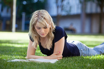 Image showing Girl reading book