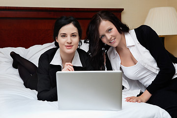 Image showing Female Executives Working on Laptop