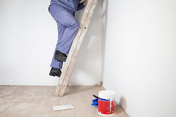 Image showing Man on Ladder