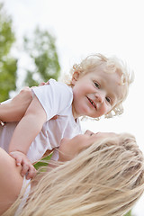 Image showing Baby and mother in playful mood