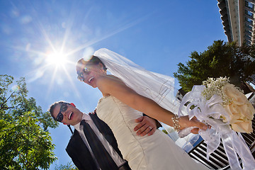 Image showing Happily married couple in sunglasses