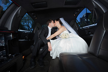 Image showing Wedding Couple Kissing Each Other