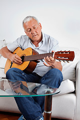 Image showing Man Playing Guitar