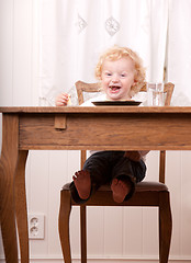 Image showing Excited Child at Meal Table