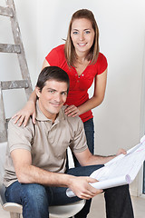 Image showing Couple with Home Blueprints