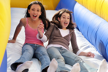 Image showing Girls on the slide