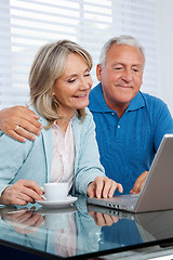 Image showing Couple Using Laptop