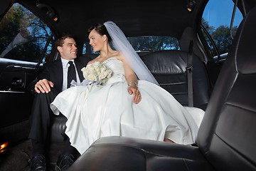 Image showing Bride and Groom in Limo