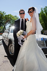 Image showing Newly wed couple in sunglasses