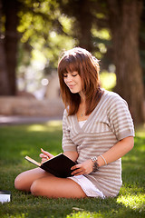 Image showing Student with Journal in Park