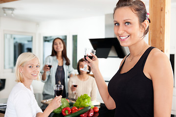 Image showing Happy woman with glassat party