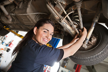 Image showing Portrait of smiling young female mechanic