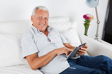 Image showing Senior Man Using Digital Tablet PC