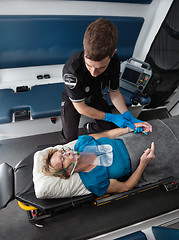 Image showing Ambulance Interior with Senior Patient
