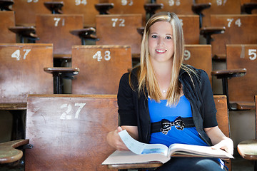 Image showing Girl studying at university hall