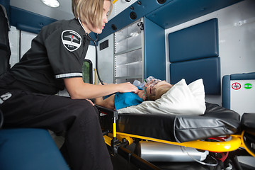 Image showing Ambulance Interior with Senior Woman