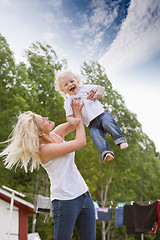 Image showing Mother playing with baby