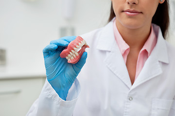 Image showing Dentist holding dental mold