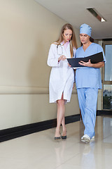 Image showing Doctor and nurse with file