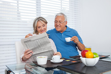 Image showing Senior Couple Reading Newspaper