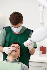 Image showing Dentist Preparing X-ray