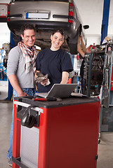 Image showing Female Mechanic with Male Customer