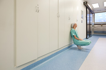 Image showing Young tired female surgeon