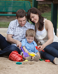 Image showing Parents Playing With Their Son