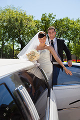 Image showing Wedding Couple with Limousine