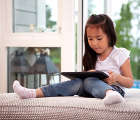 Image showing Child Using Digital Tablet