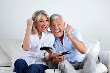 Image showing Couple Having Fun Playing Video Game