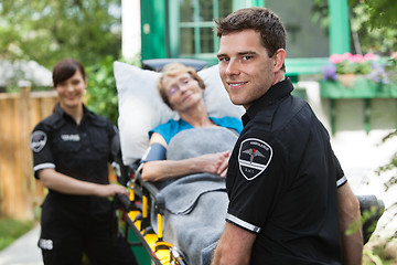 Image showing Ambulance Worker with Patient