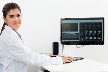 Image showing Dentist Looking at X-rays