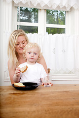 Image showing Mother and Son Eating Lunch