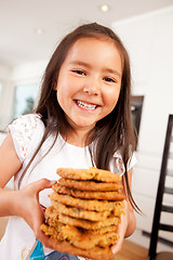 Image showing Happy Cute Girl Holding Cookies