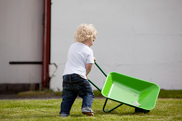 Image showing Child with Wheelbarrow