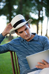 Image showing Man Looking at Tablet PC Screen