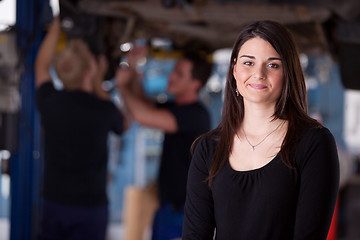 Image showing Happy Woman Auto Repair Customer