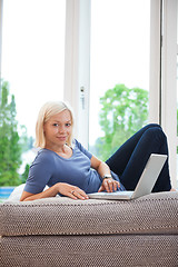 Image showing Pretty female using laptop