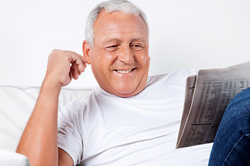 Image showing Senior Man Reading Newspaper At Home