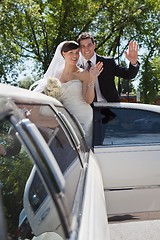 Image showing Wedding Couple Waving