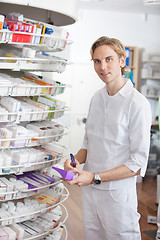 Image showing Male Pharmacist Working at Drugstore