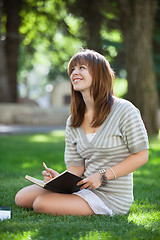 Image showing Thoughtful college student