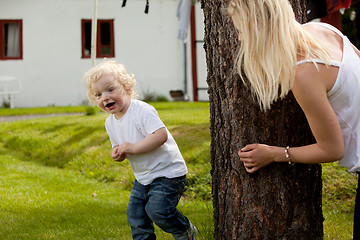 Image showing Young Boy Playing Hide and Seek